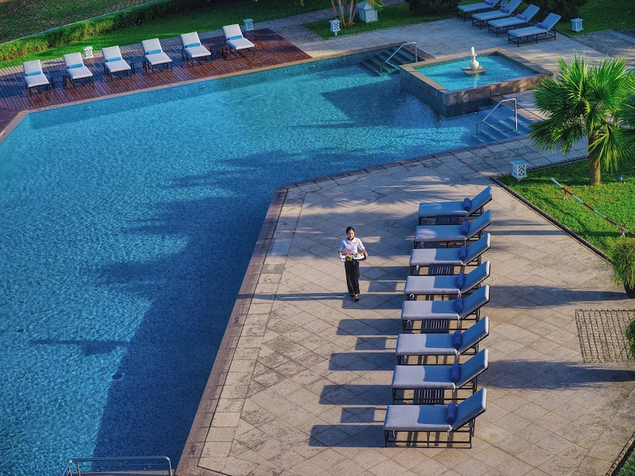 Outdoor pool, pool umbrellas, pool loungers