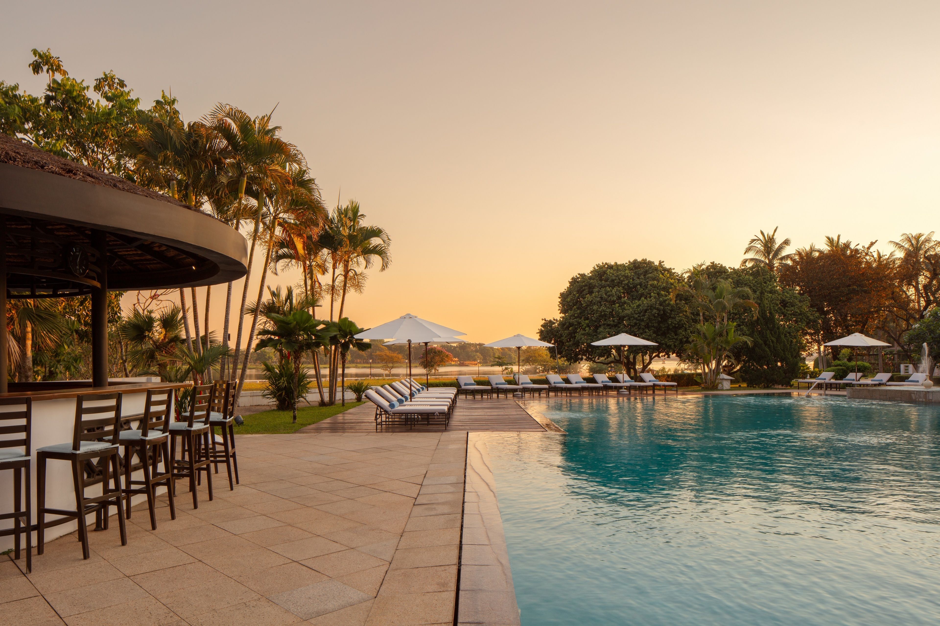 outdoor pool, pool umbrellas, pool loungers