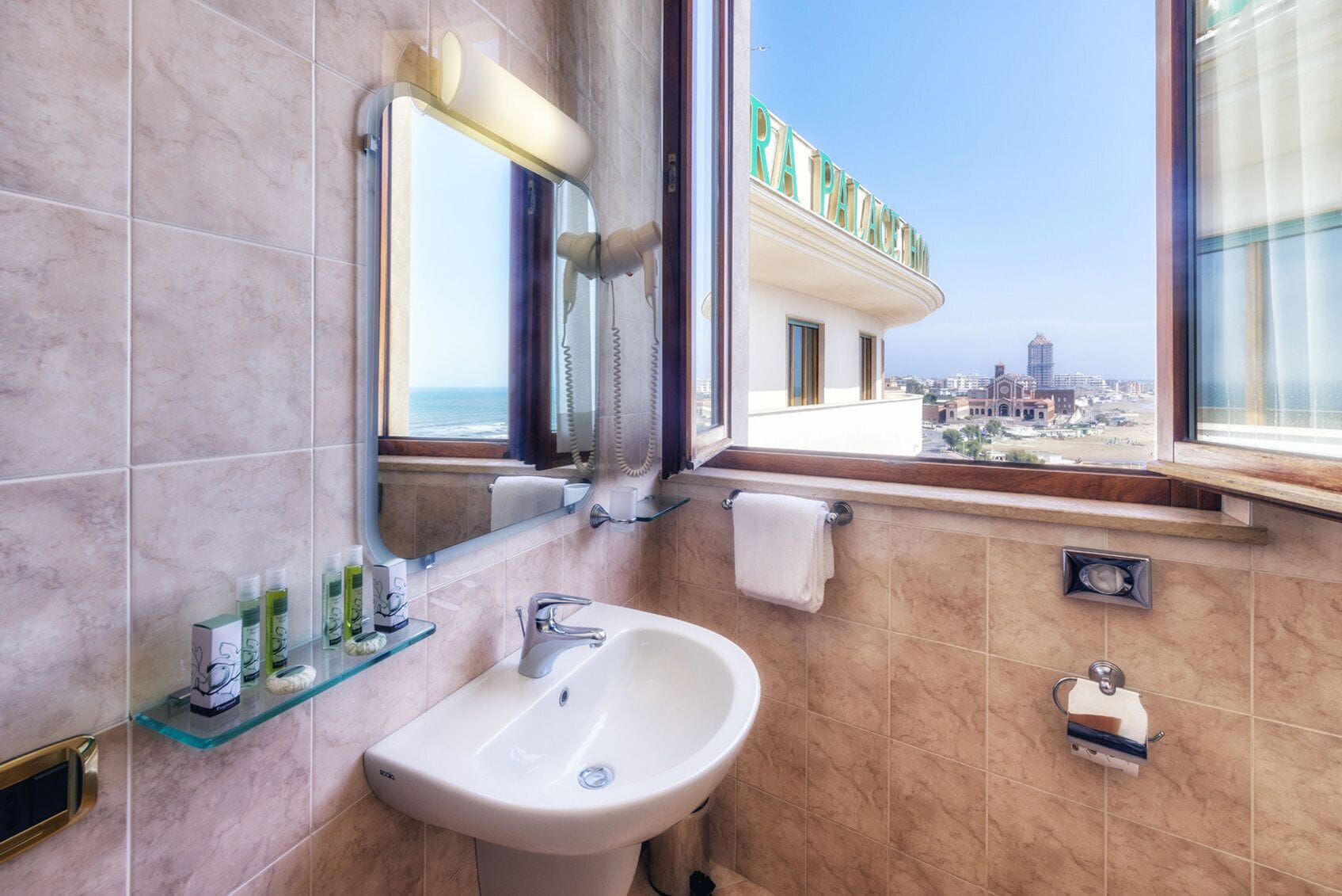 free toiletries, hair dryer, slippers, bidet