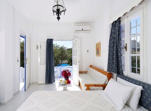 Triple Room (Pool or Sea View) | Egyptian cotton sheets, premium bedding, in-room safe