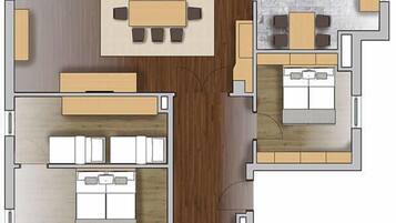 A floor plan with a living area, dining room, kitchen, and a bathroom.