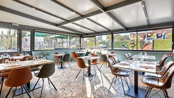 Lunch, dinner served; French cuisine, al fresco dining