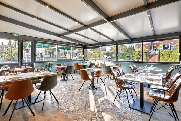 Lunch, dinner served; French cuisine, al fresco dining