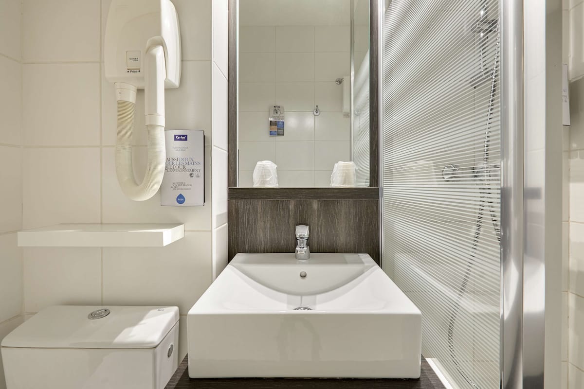 shower, eco-friendly toiletries, hair dryer, towels