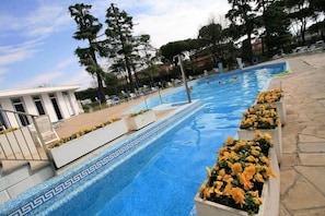 Indoor pool, outdoor pool, pool umbrellas, sun loungers