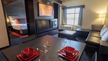 Presidential Suite, 1 King Bed | Living area | 55-inch flat-screen TV with cable channels, TV
