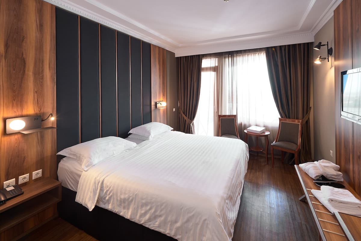 Down comforters, desk, blackout drapes, soundproofing