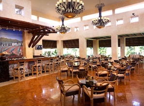 4 bars/lounges, swim-up bar, poolside bar