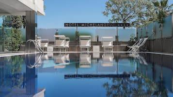 Outdoor pool, sun loungers