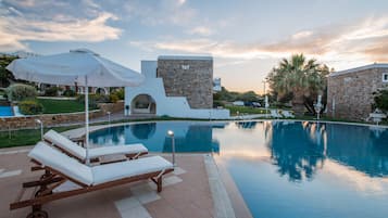 2 outdoor pools, pool umbrellas, pool loungers