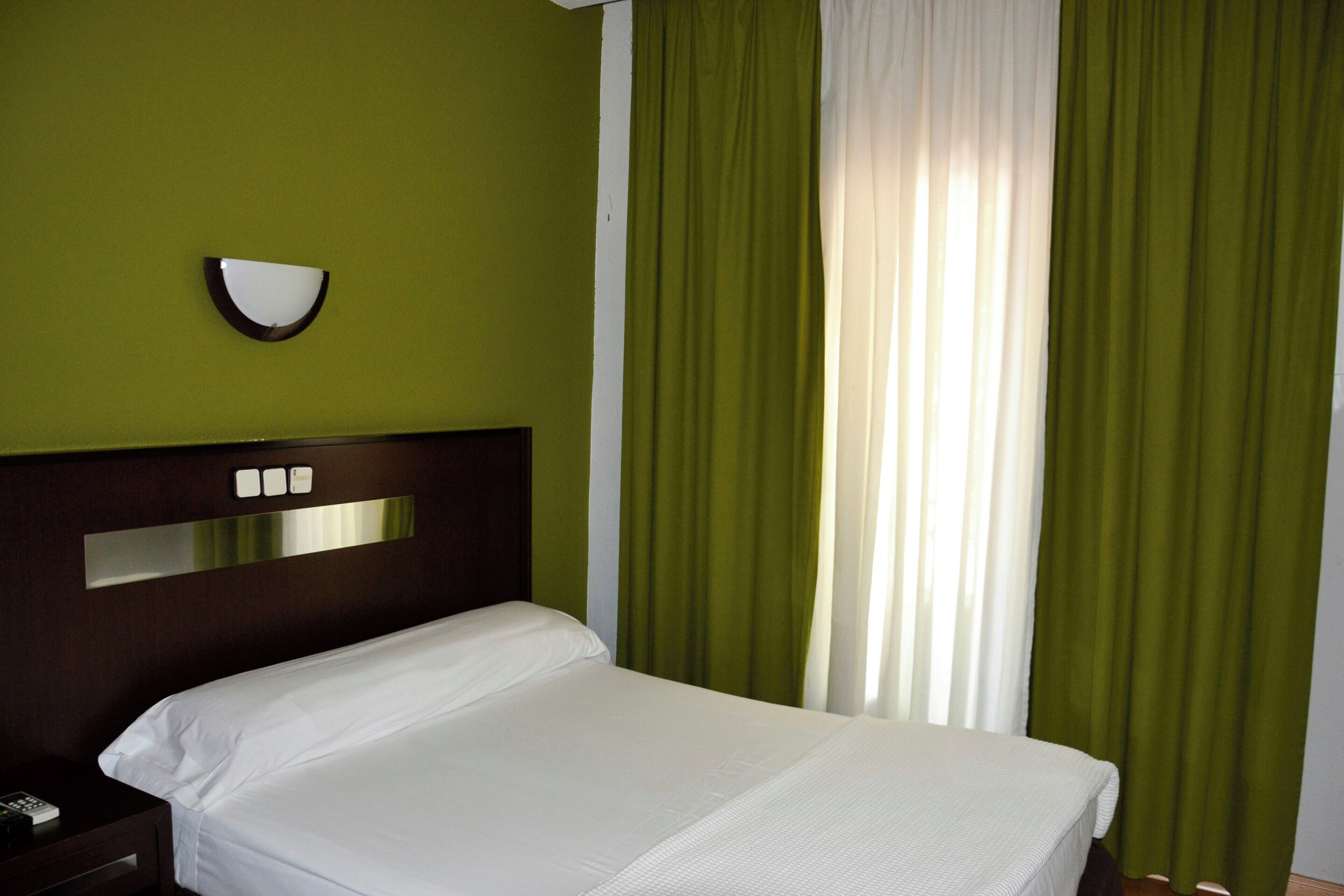 Basic Single Room | Desk, blackout drapes, WiFi (free), bed sheets