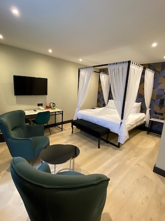 King Suite with Spa Bath | 1 bedroom, down comforters, in-room safe, desk