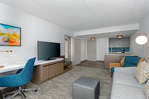 Deluxe Suite, 1 King Bed, Accessible (Roll-In Shower) | Living area | 50-inch flat-screen TV with cable channels, TV, pay movies