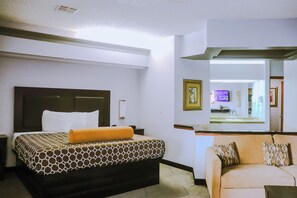 Suite exécutive, 1 trÚs grand lit, baignoire à jets | Salle de bain | Séchoir à cheveux, serviettes fournies