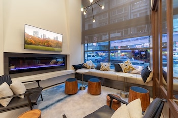 Sitting area in hotel lobby at Citadines Connect Fifth Avenue New York
