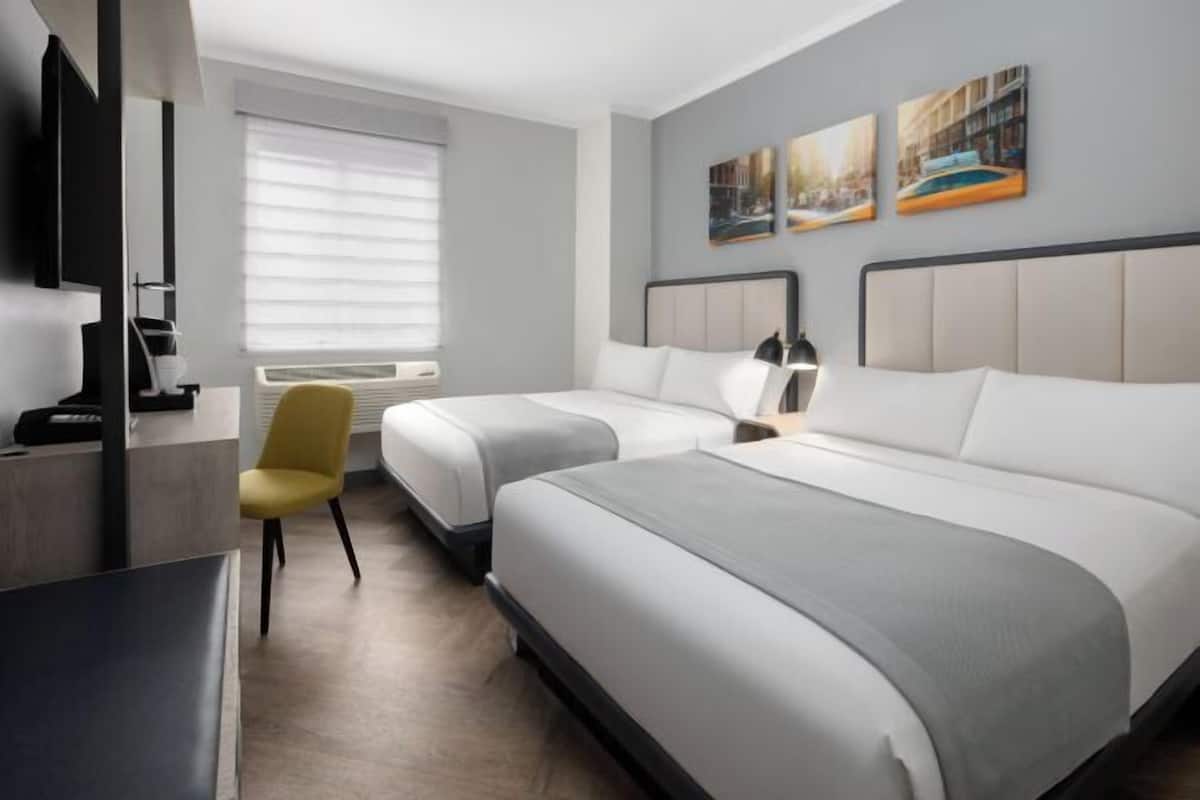 Hypo-allergenic bedding, down duvets, in-room safe, desk