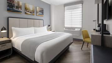 Hypo-allergenic bedding, down duvets, in-room safe