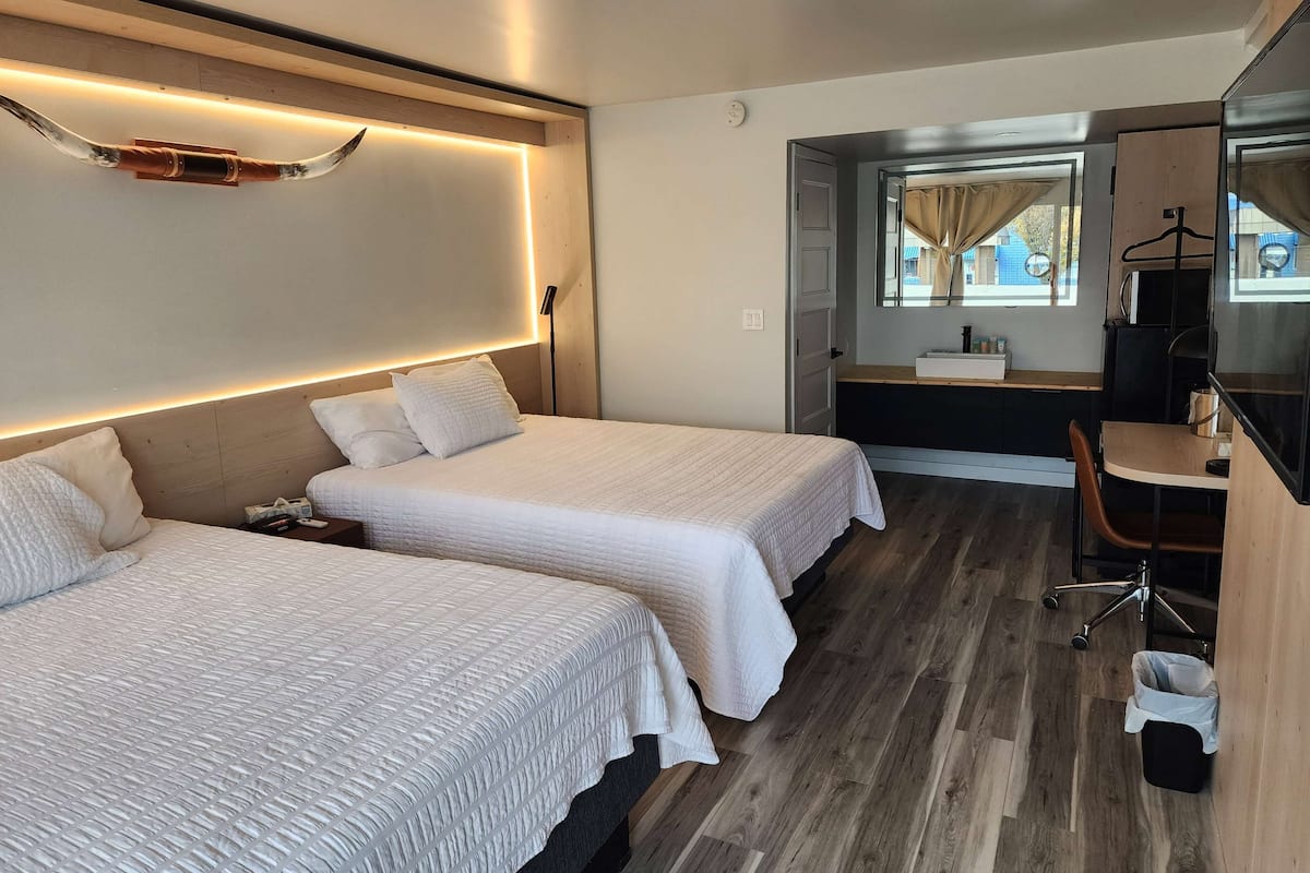 Room, 2 Queen Beds, Non Smoking | Individually decorated, individually furnished, desk, laptop workspace