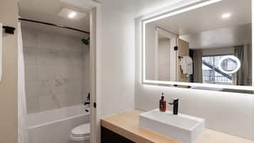 Combined shower/tub, deep soaking tub, free toiletries, hair dryer