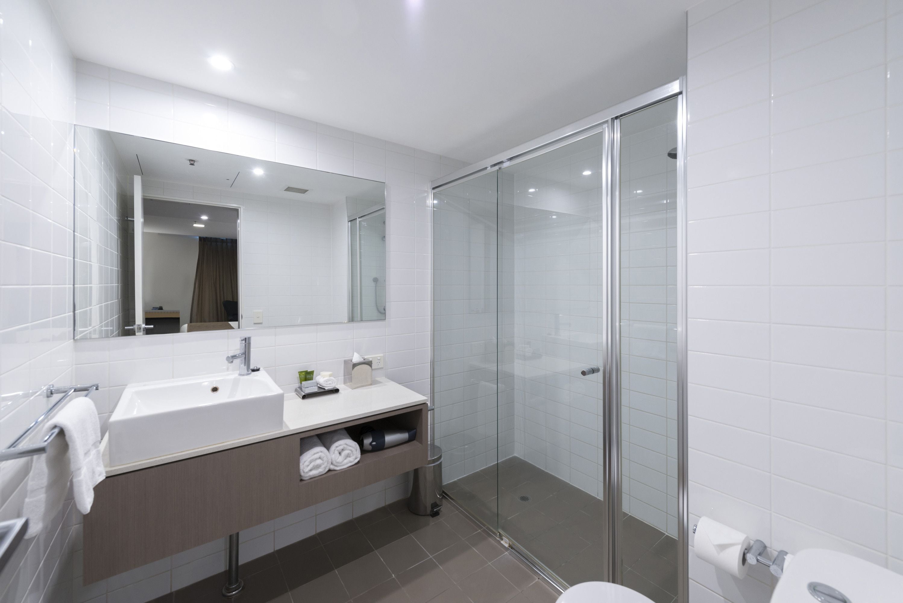 shower, free toiletries, hair dryer, towels