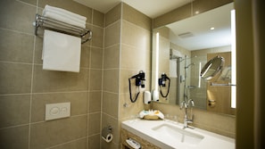Shower, eco-friendly toiletries, hair dryer, slippers