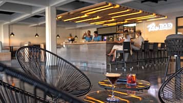 2 bars/lounges, poolside bar, beach bar