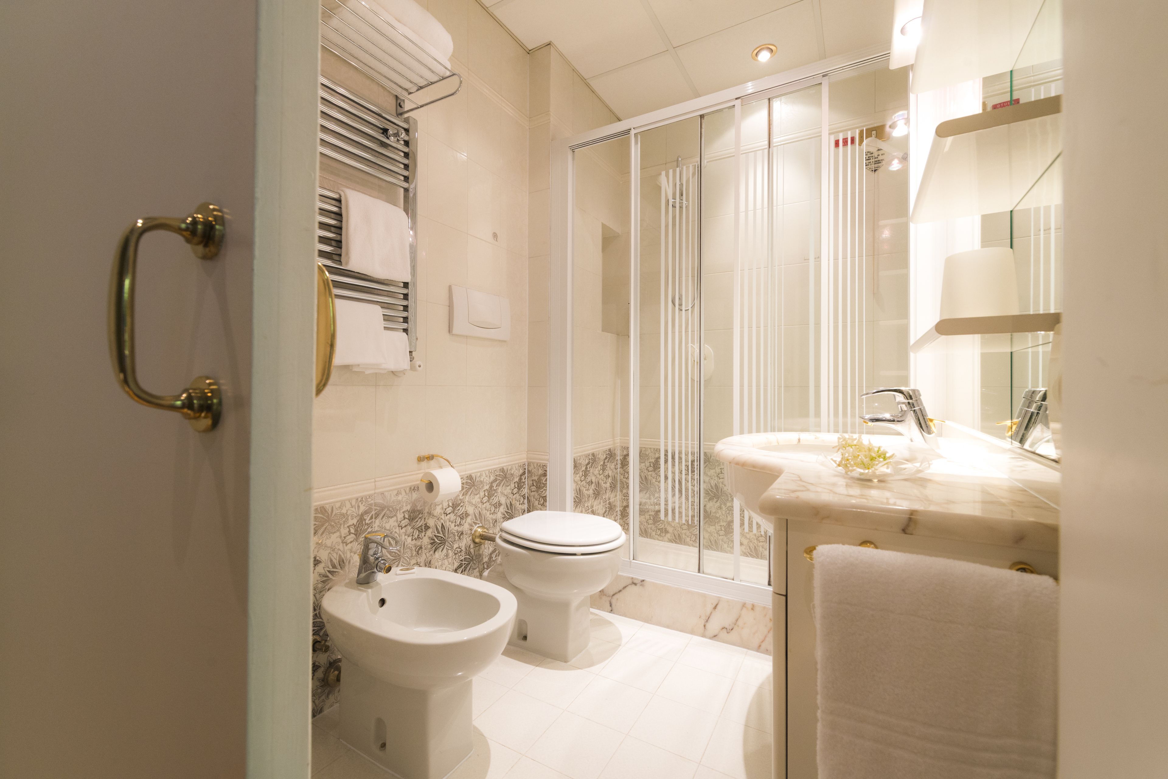 superior double room, garden area | bathroom | hair dryer, bidet, towels