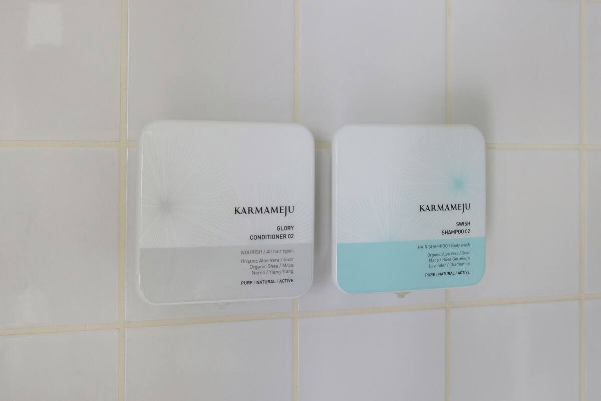 bathtub, free toiletries, hair dryer, towels