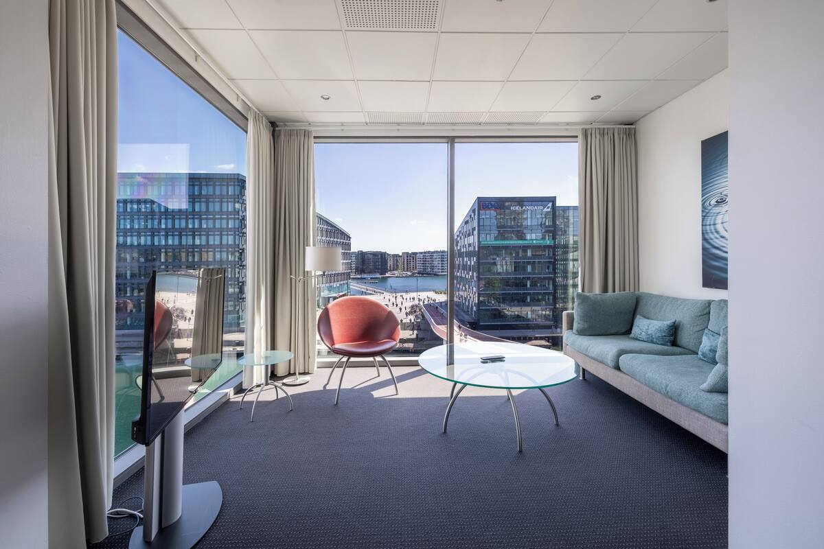 junior suite | living area | 42-inch led tv with satellite channels, tv