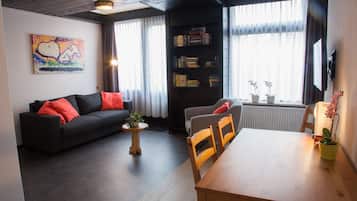 Familiekamer | Woonruimte | Een lcd-televisie