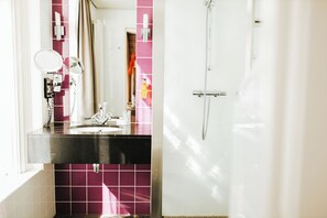 Designer toiletries, hair dryer, towels, soap