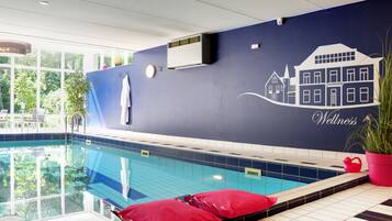 Indoor pool, open 8:00 AM to 10:00 PM, pool loungers