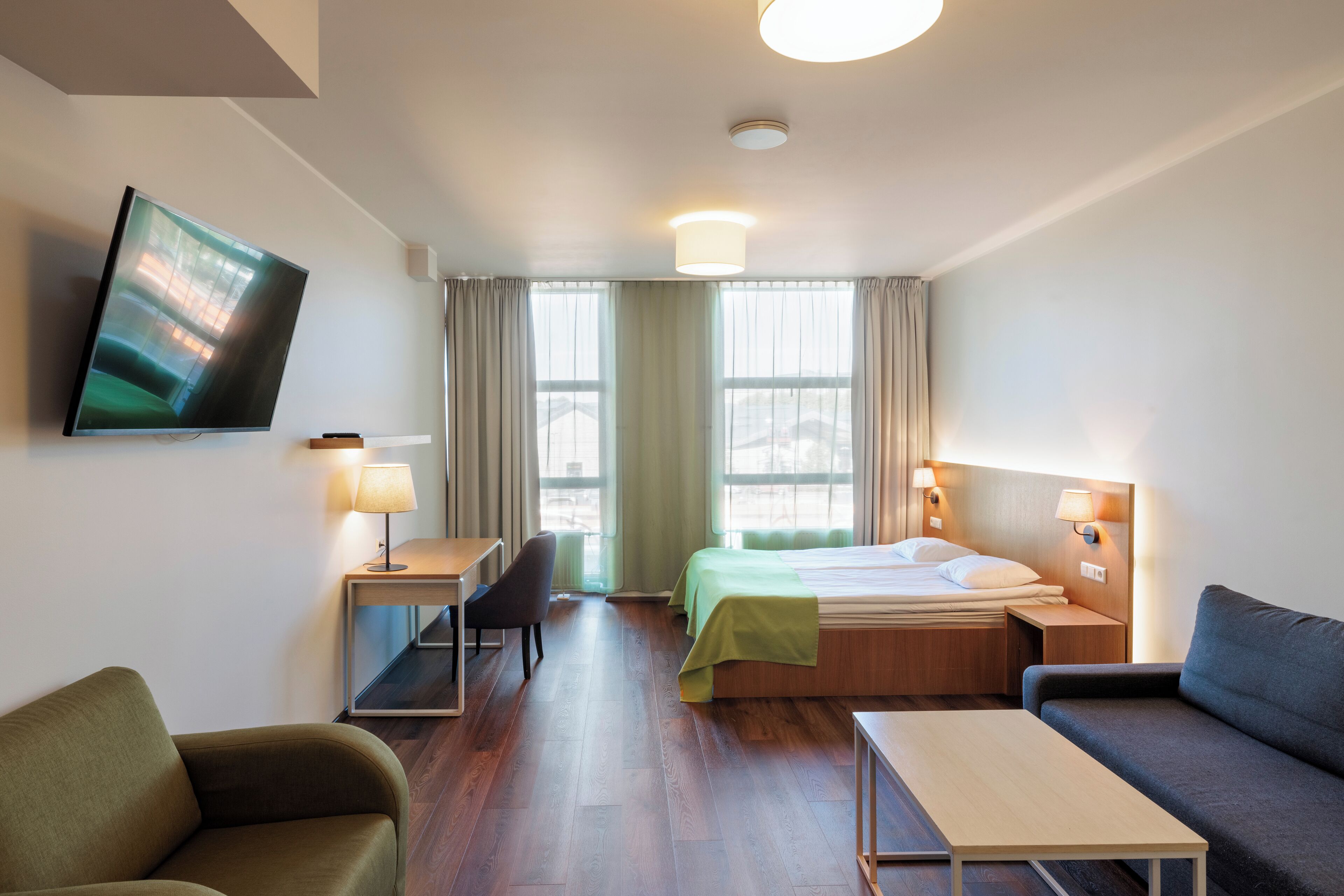 Family Room | Desk, laptop workspace, blackout drapes, soundproofing