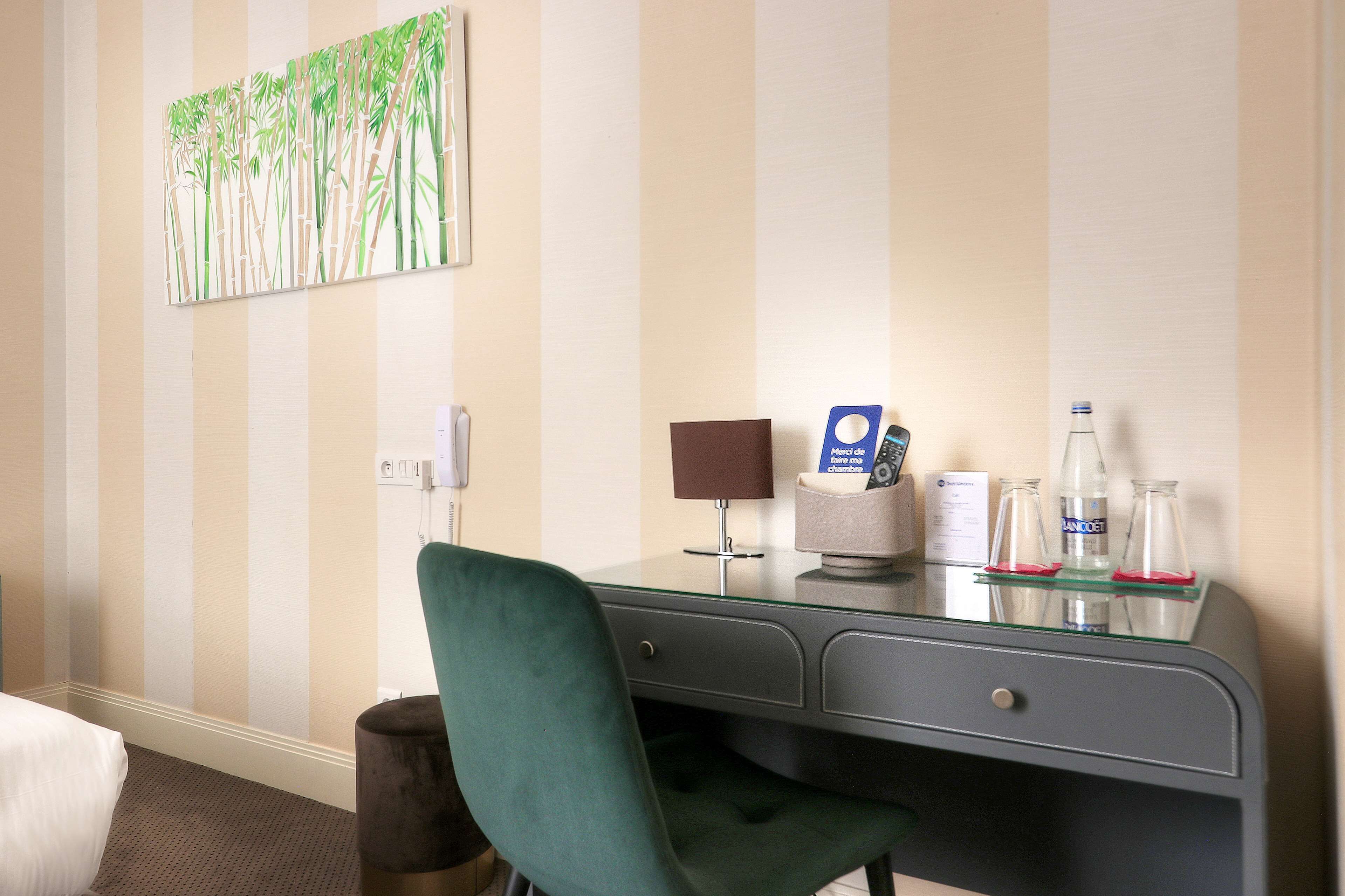 superior room, 1 queen bed, courtyard view | in-room safe, desk, soundproofing, iron/ironing board