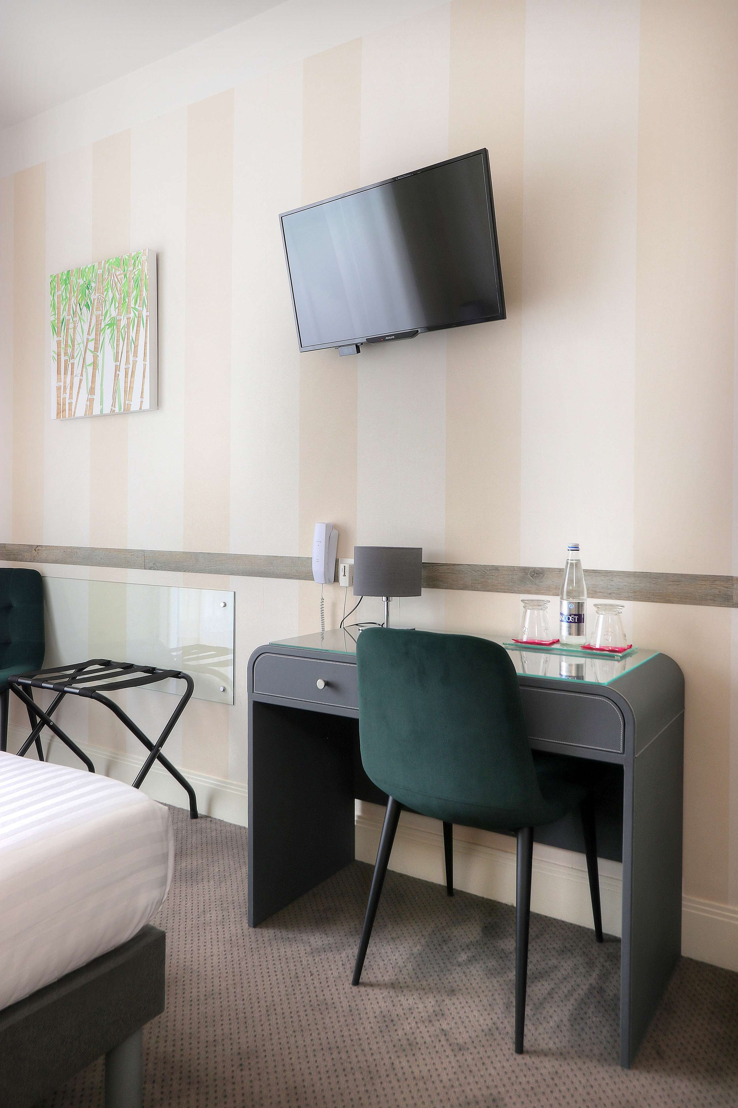 comfort room, 1 queen bed, bathtub (larger room) | in-room safe, desk, soundproofing, iron/ironing board