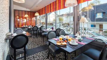 Daily buffet breakfast (EUR 15 per person)