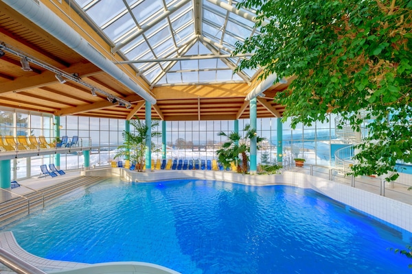2 indoor pools, seasonal outdoor pool, pool loungers