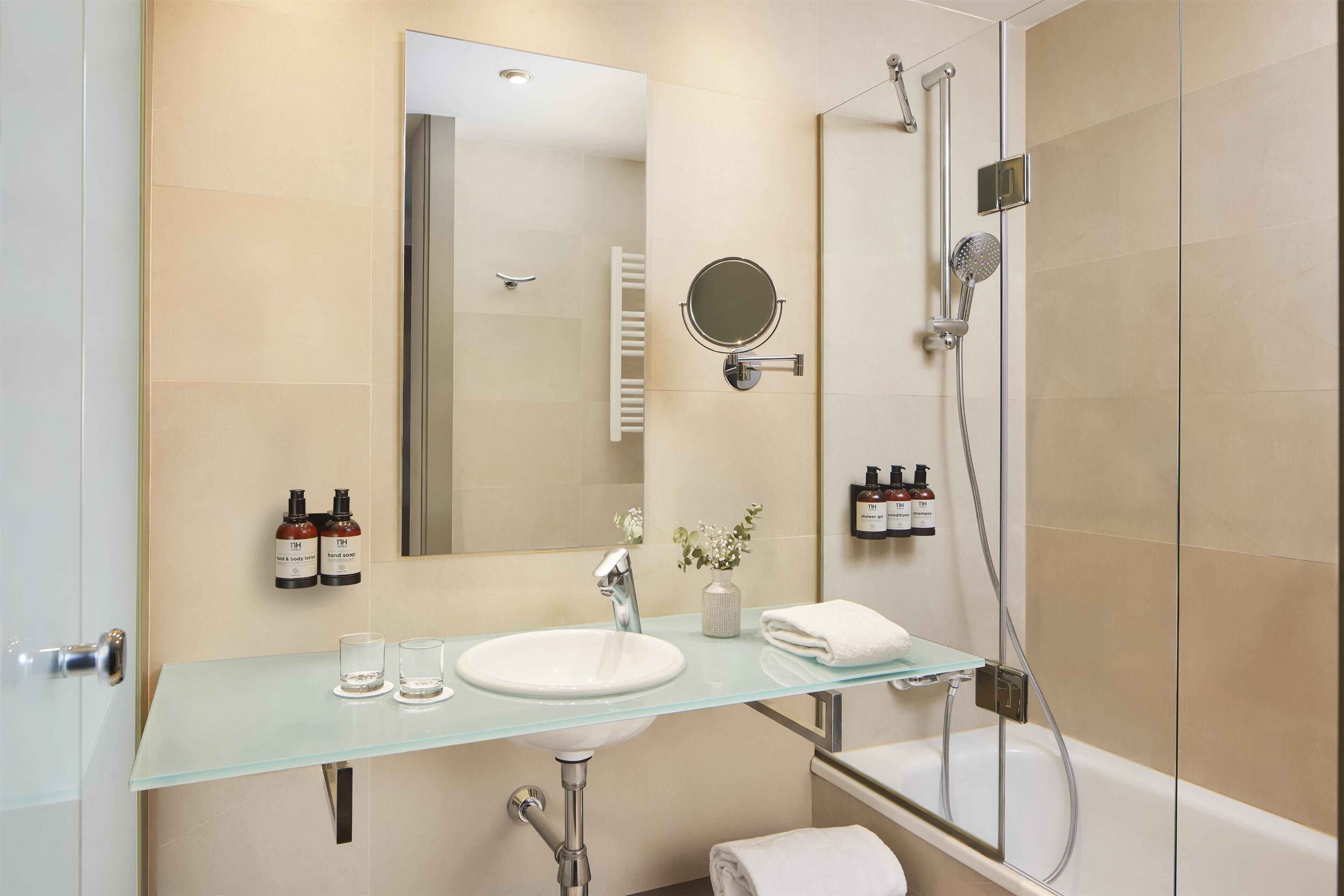 deep-soaking bathtub, eco-friendly toiletries, hair dryer, bidet