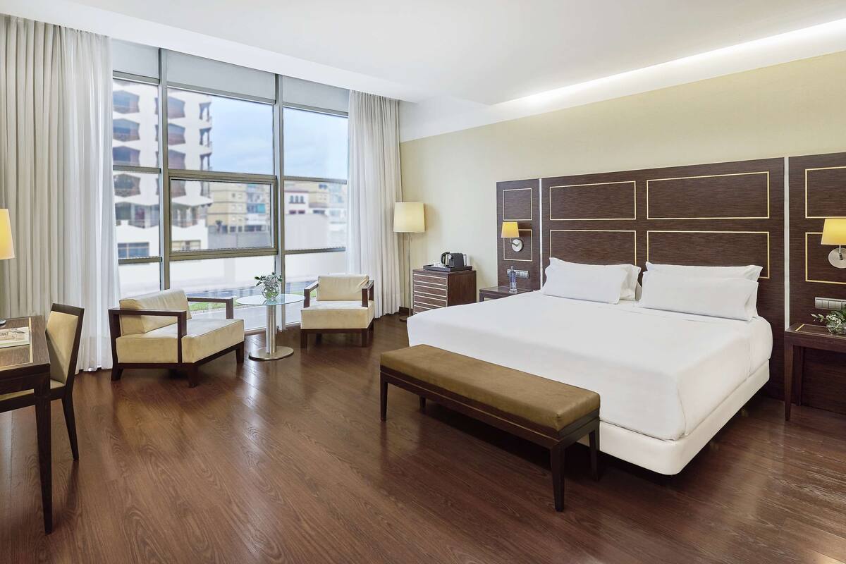 superior room | minibar, in-room safe, desk, blackout curtains