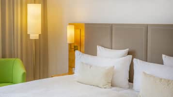 Habitación Deluxe | Ropa de cama hipoalergénica y edredón