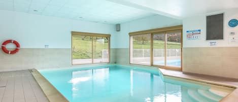 Indoor pool, outdoor pool, open 9:00 AM to 7:00 PM, pool loungers