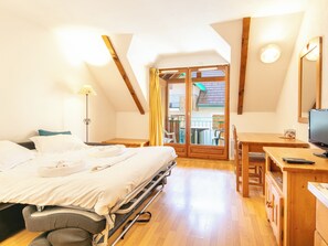 Studio 2 personnes | Área de sala de estar | Televisión de pantalla plana 