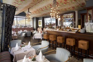 Breakfast, lunch, dinner served; local cuisine 