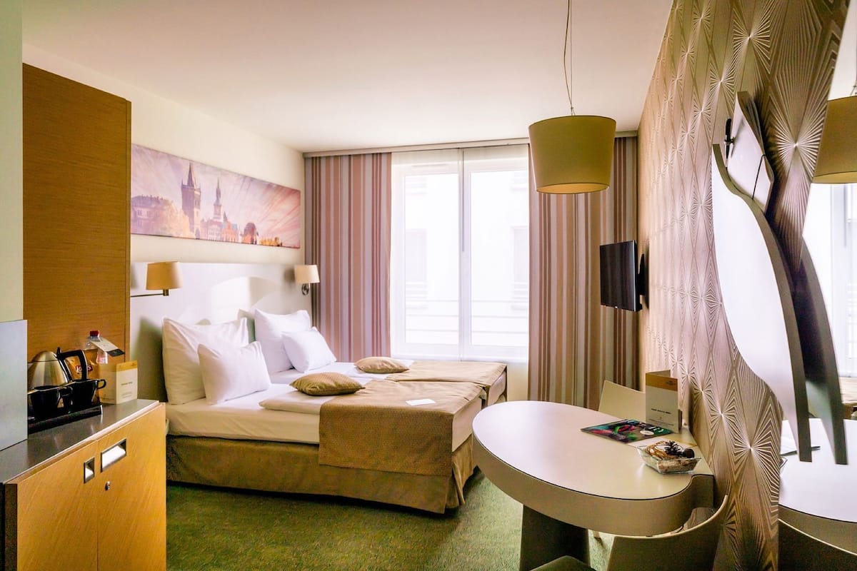 Premium bedding, pillow-top beds, minibar, in-room safe