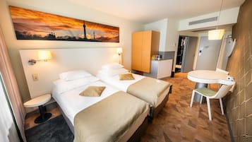 Premium bedding, pillowtop beds, minibar, in-room safe