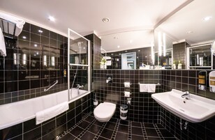 Eco-friendly toiletries, hair dryer, bathrobes, slippers