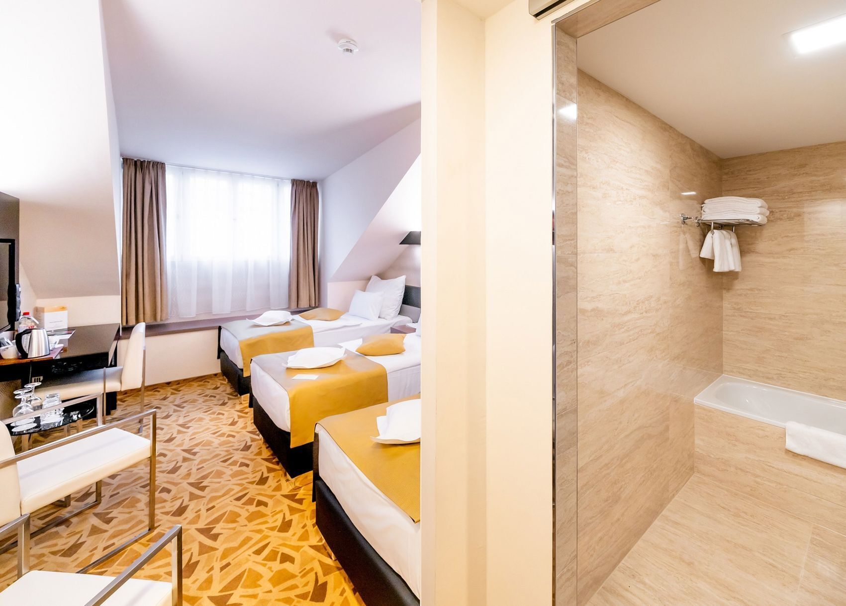 Premium bedding, pillow-top beds, minibar, in-room safe