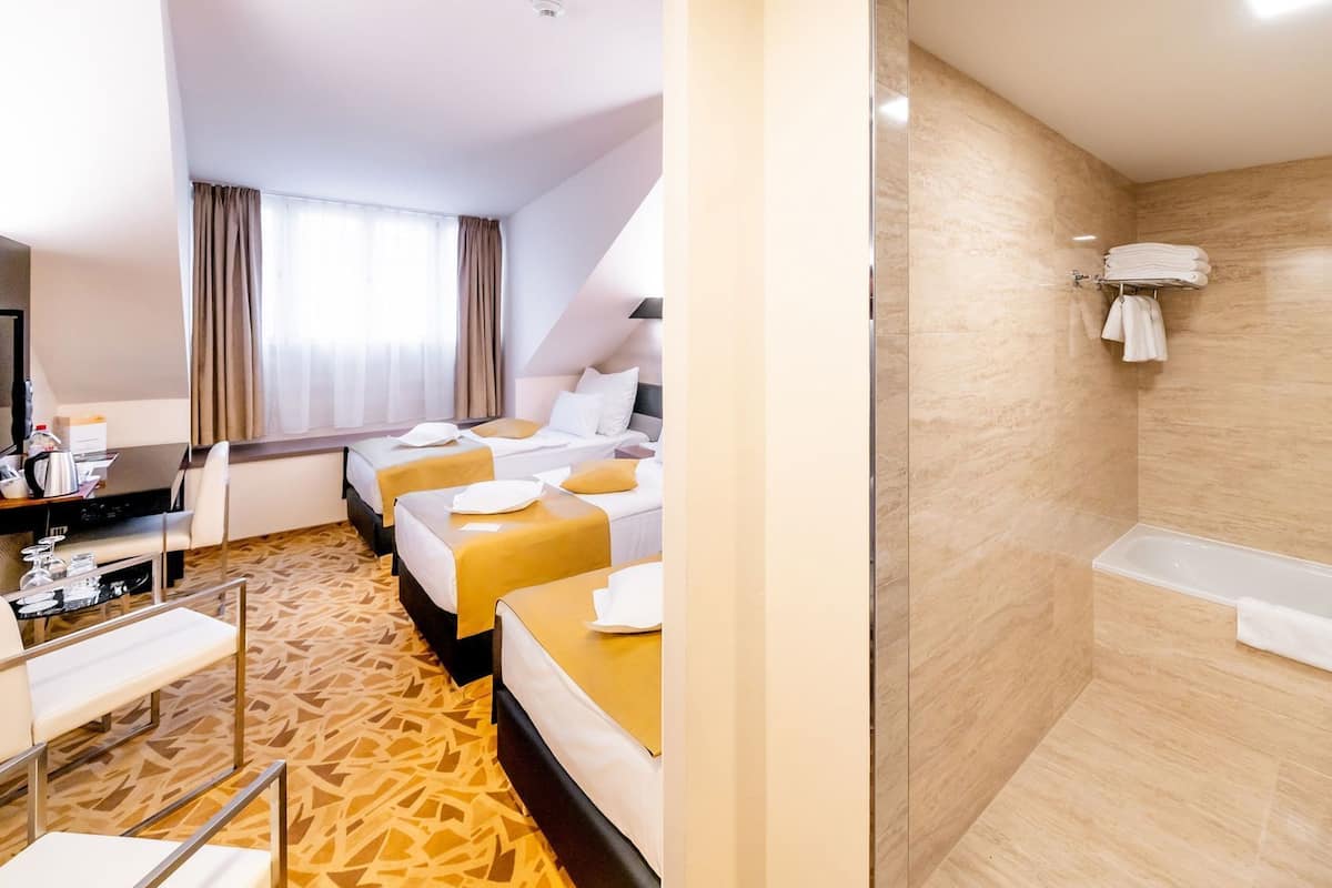 Premium bedding, pillow-top beds, minibar, in-room safe