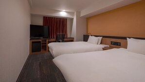 A hotel room with two beds, a desk with a television, and a control panel on the wall. - the b nagoya (Nagoya)
