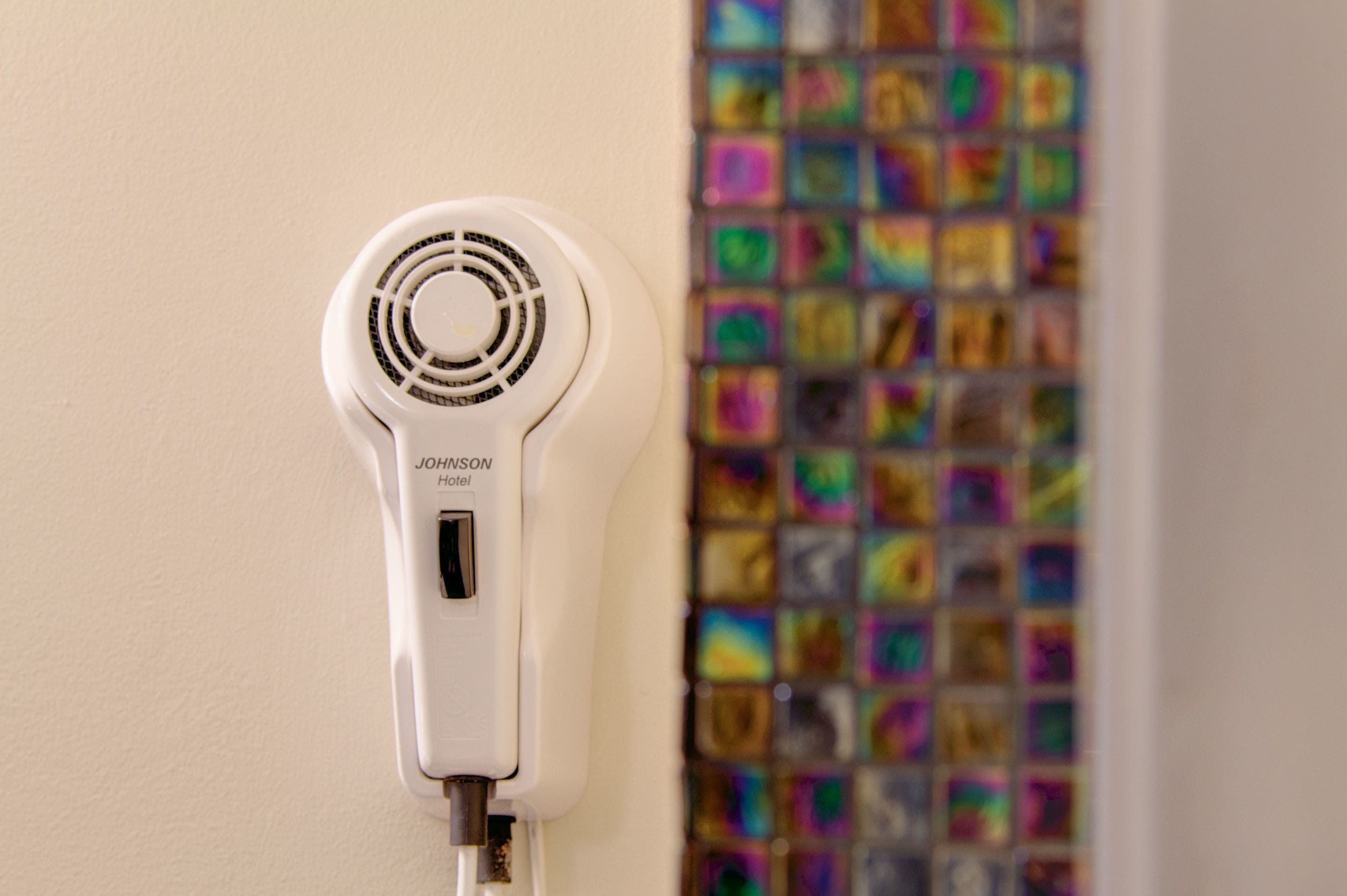 hair dryer, slippers, towels, soap